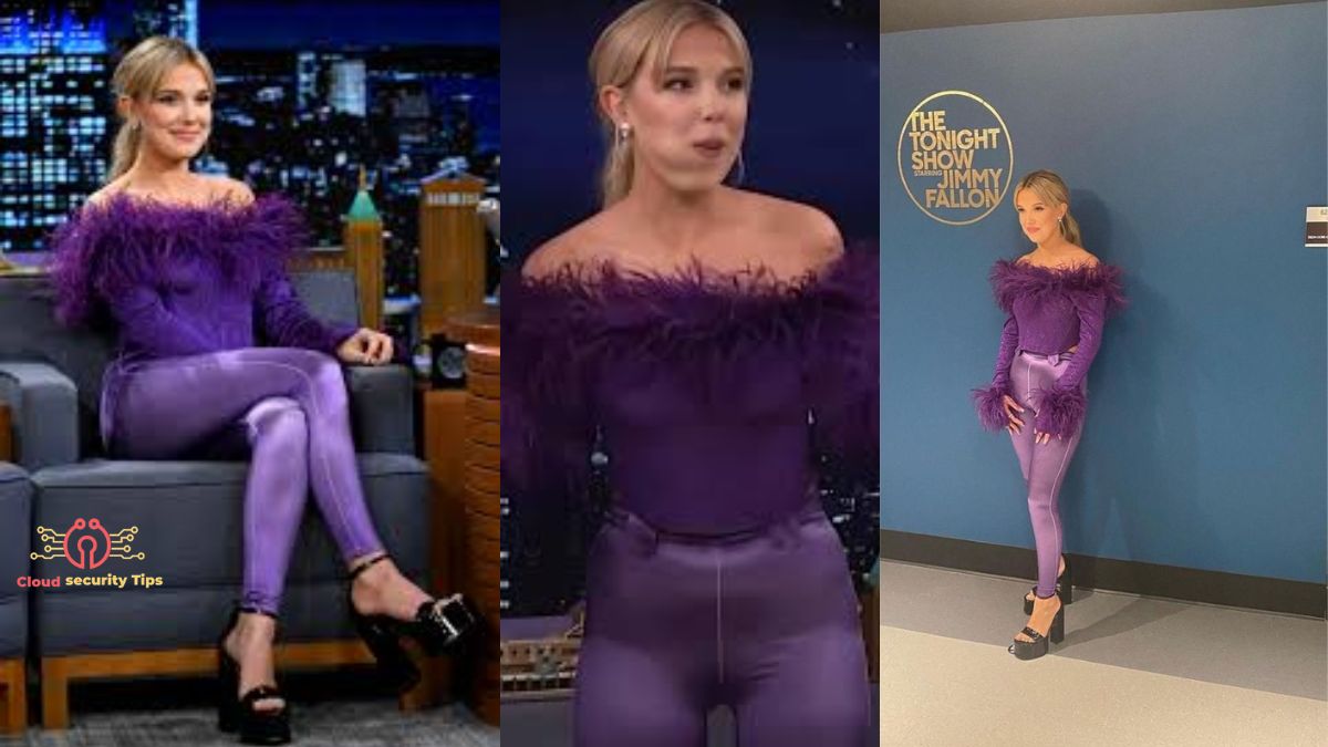 Millie Bobby Brown wearing stylish purple pants with a minimal outfit